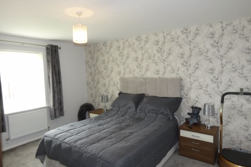 Bedroom One- click for photo gallery
